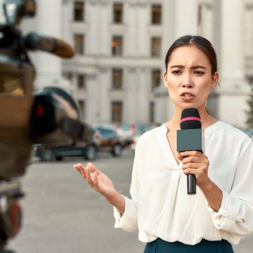 Reporter delivering a live standup to camera