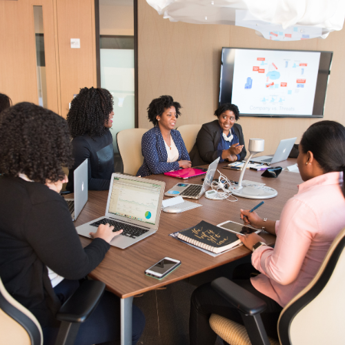Academic team collaborating around a conference table