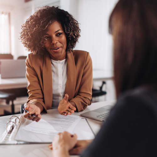 Consultant reviewing performance feedback with a client